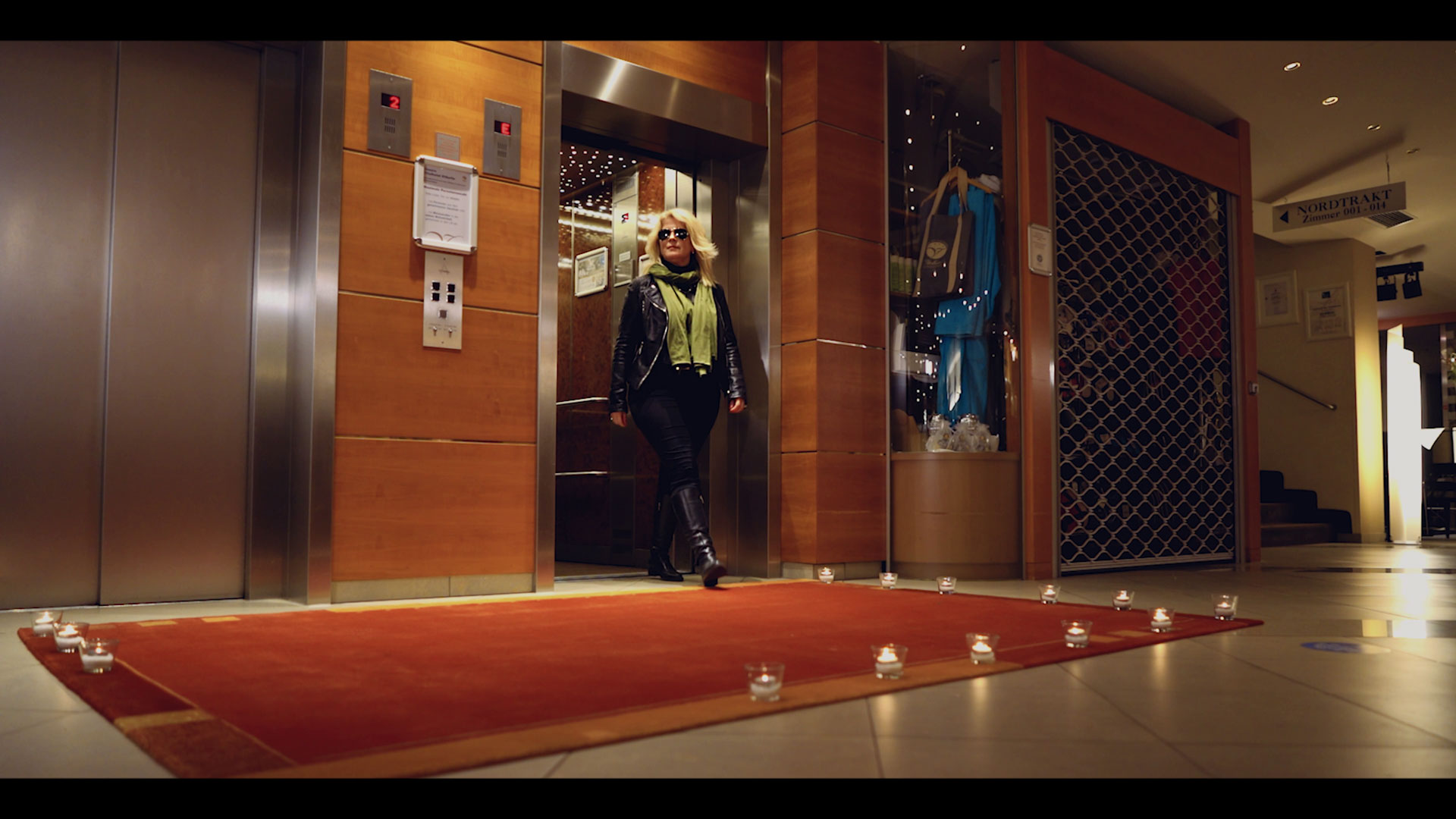 Claudia Wendner, owner of Vitalhotel der Parktherme enters.