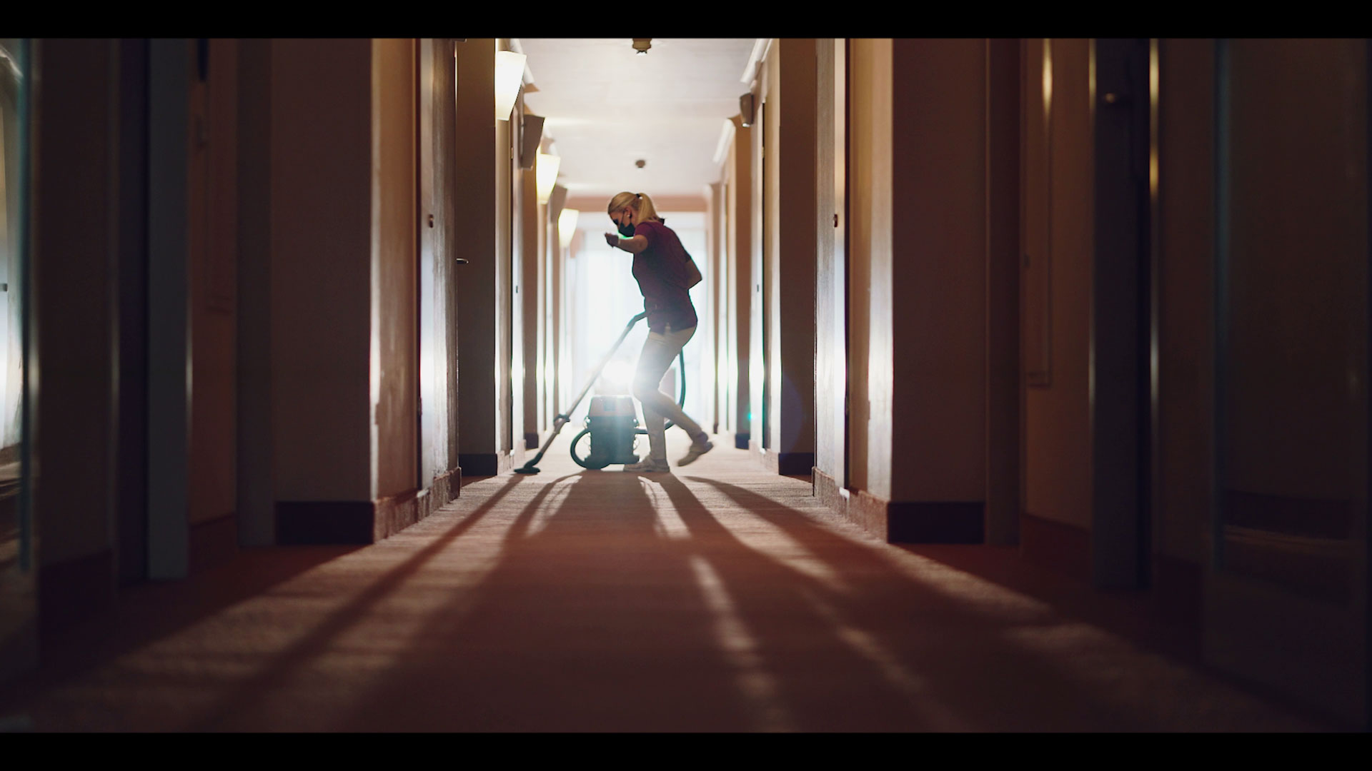 Dancing while vacuuming